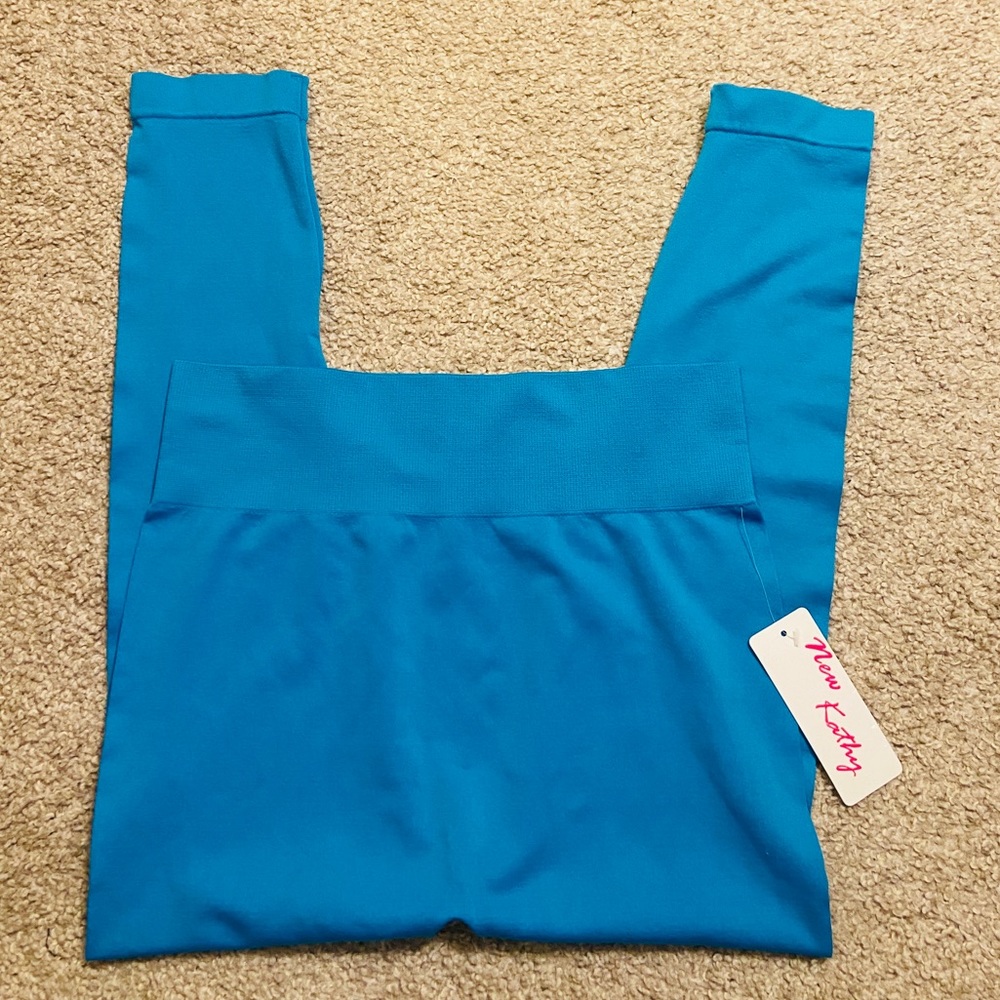 Blue leggings, one size new with tags, stretchy material